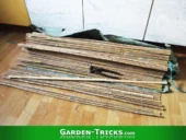 Sichtschutzmatten aus Bambus dienen als billiges Rohmaterial für die wiederverwertbare Bumentopf-Beschriftung.